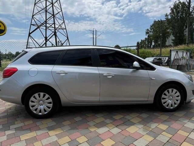 Серый Опель Астра, объемом двигателя 1.7 л и пробегом 197 тыс. км за 7400 $, фото 4 на Automoto.ua