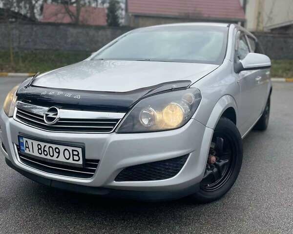 Серый Опель Астра, объемом двигателя 1.6 л и пробегом 235 тыс. км за 6299 $, фото 3 на Automoto.ua