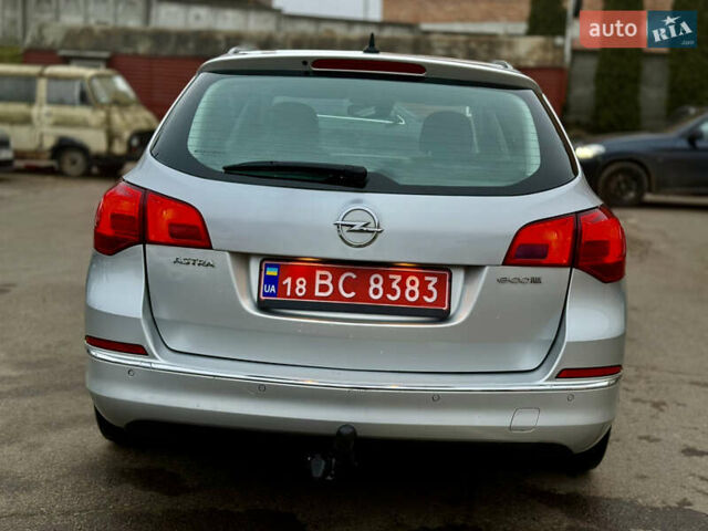 Серый Опель Астра, объемом двигателя 1.6 л и пробегом 204 тыс. км за 7499 $, фото 7 на Automoto.ua