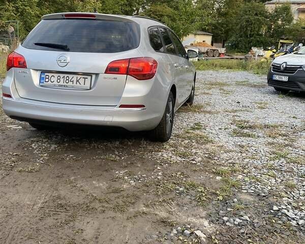 Серый Опель Астра, объемом двигателя 1.7 л и пробегом 229 тыс. км за 7200 $, фото 12 на Automoto.ua