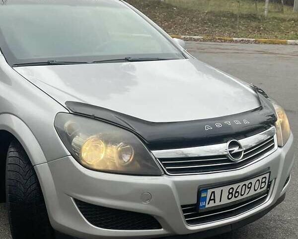 Серый Опель Астра, объемом двигателя 1.6 л и пробегом 235 тыс. км за 6299 $, фото 6 на Automoto.ua