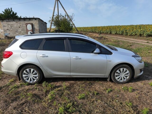 Серый Опель Астра, объемом двигателя 2 л и пробегом 288 тыс. км за 7600 $, фото 4 на Automoto.ua