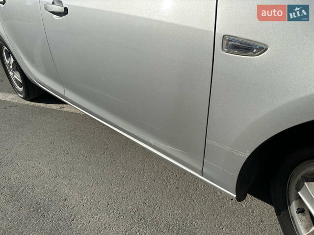 Серый Опель Астра, объемом двигателя 1.69 л и пробегом 212 тыс. км за 7500 $, фото 6 на Automoto.ua