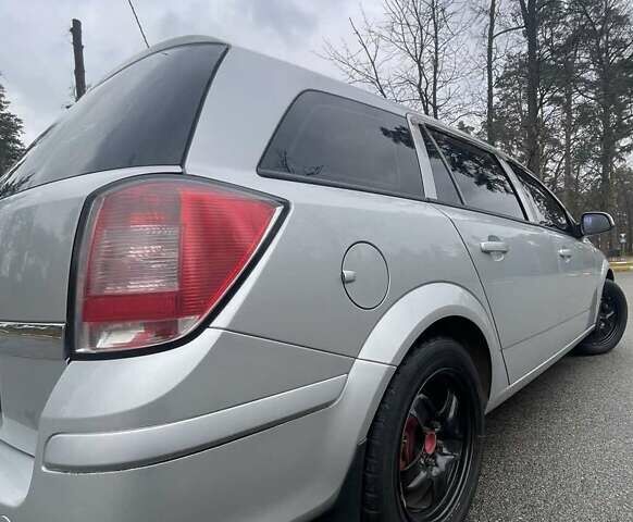 Серый Опель Астра, объемом двигателя 1.6 л и пробегом 235 тыс. км за 6299 $, фото 12 на Automoto.ua