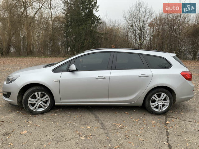Сірий Опель Астра, об'ємом двигуна 1.7 л та пробігом 247 тис. км за 7400 $, фото 5 на Automoto.ua