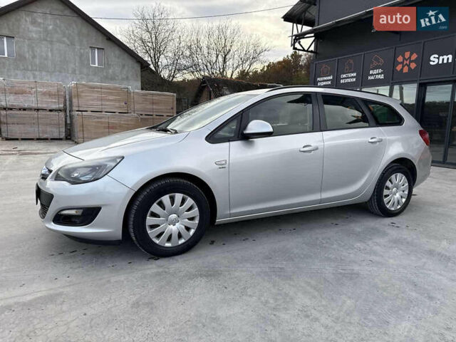 Серый Опель Астра, объемом двигателя 1.7 л и пробегом 264 тыс. км за 7200 $, фото 13 на Automoto.ua