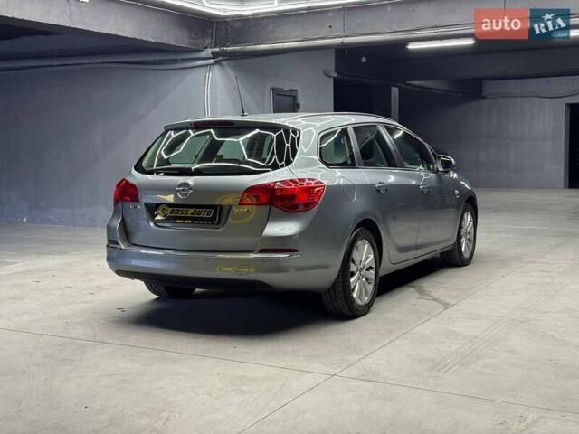 Серый Опель Астра, объемом двигателя 1.7 л и пробегом 208 тыс. км за 8800 $, фото 5 на Automoto.ua