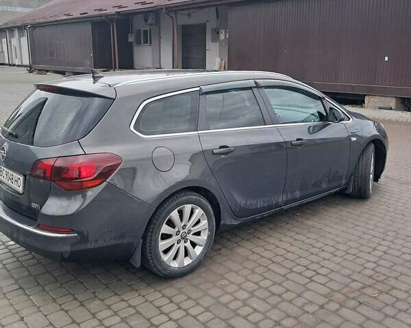 Серый Опель Астра, объемом двигателя 1.7 л и пробегом 232 тыс. км за 8500 $, фото 4 на Automoto.ua