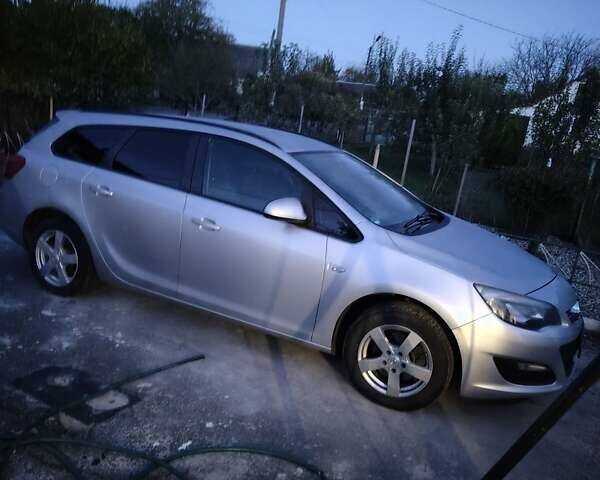Опель Астра 2013 в Староконстантинов на Automoto.ua Серый Опель Астра, объемом двигателя 1.7 л и пробегом 276 тыс. км за 7000 $, фото 11 на Automoto.ua