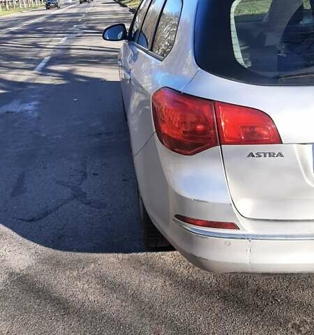 Серый Опель Астра, объемом двигателя 1.69 л и пробегом 331 тыс. км за 6800 $, фото 10 на Automoto.ua