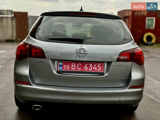 Серый Опель Астра, объемом двигателя 2 л и пробегом 224 тыс. км за 7699 $, фото 8 на Automoto.ua