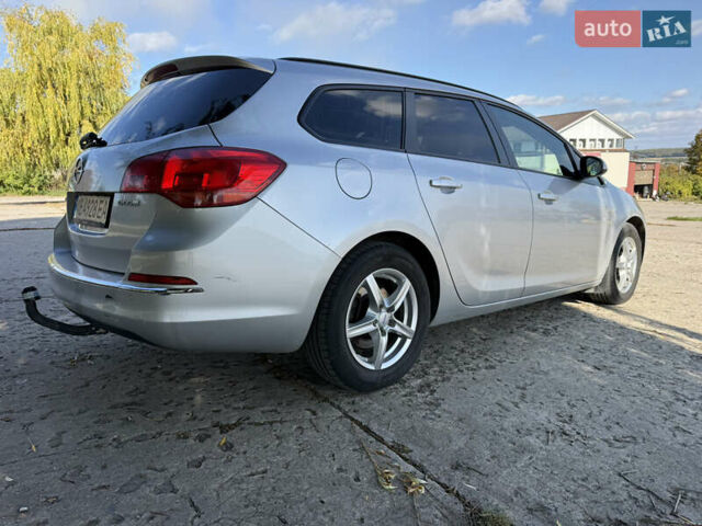Сірий Опель Астра, об'ємом двигуна 1.69 л та пробігом 229 тис. км за 6999 $, фото 27 на Automoto.ua