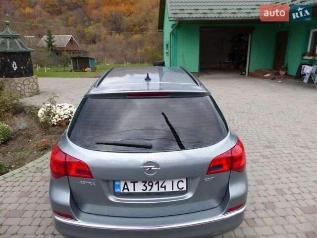 Серый Опель Астра, объемом двигателя 1.7 л и пробегом 316 тыс. км за 7100 $, фото 4 на Automoto.ua