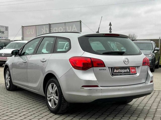 Серый Опель Астра, объемом двигателя 1.7 л и пробегом 330 тыс. км за 5990 $, фото 6 на Automoto.ua