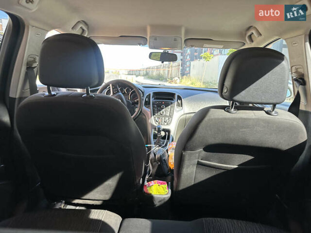 Серый Опель Астра, объемом двигателя 1.69 л и пробегом 212 тыс. км за 7500 $, фото 9 на Automoto.ua