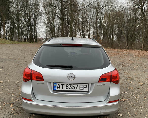 Сірий Опель Астра, об'ємом двигуна 1.7 л та пробігом 247 тис. км за 7400 $, фото 4 на Automoto.ua