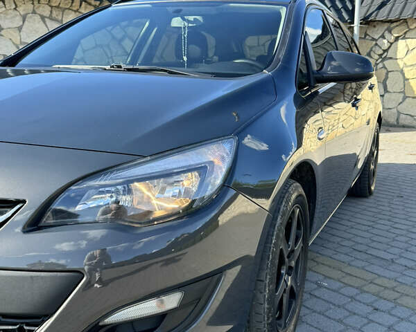 Сірий Опель Астра, об'ємом двигуна 1.7 л та пробігом 256 тис. км за 7000 $, фото 12 на Automoto.ua