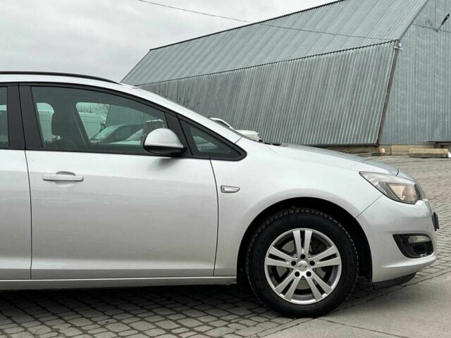 Серый Опель Астра, объемом двигателя 1.7 л и пробегом 330 тыс. км за 5990 $, фото 11 на Automoto.ua