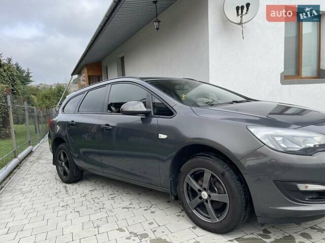 Сірий Опель Астра, об'ємом двигуна 1.4 л та пробігом 171 тис. км за 8600 $, фото 2 на Automoto.ua