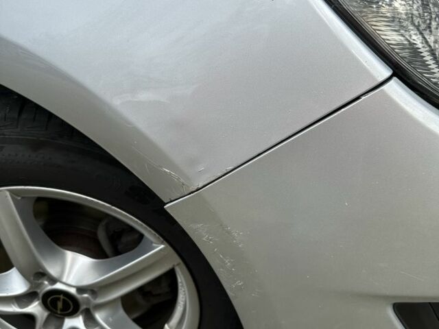 Серый Опель Астра, объемом двигателя 1.7 л и пробегом 277 тыс. км за 6300 $, фото 4 на Automoto.ua