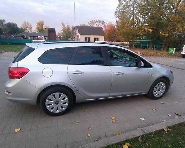 Серый Опель Астра, объемом двигателя 1.7 л и пробегом 207 тыс. км за 7200 $, фото 2 на Automoto.ua