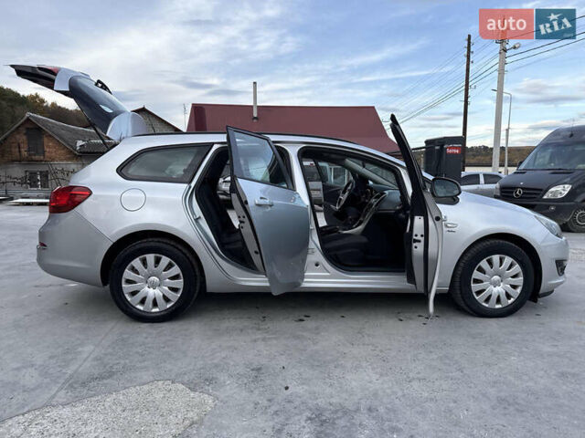 Серый Опель Астра, объемом двигателя 1.7 л и пробегом 264 тыс. км за 7200 $, фото 19 на Automoto.ua