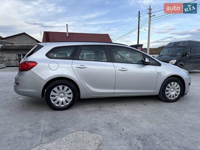 Серый Опель Астра, объемом двигателя 1.7 л и пробегом 264 тыс. км за 7200 $, фото 6 на Automoto.ua