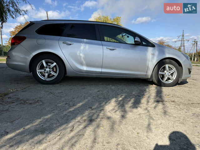 Сірий Опель Астра, об'ємом двигуна 1.69 л та пробігом 229 тис. км за 6999 $, фото 23 на Automoto.ua