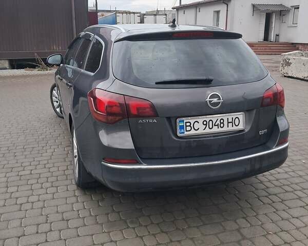 Серый Опель Астра, объемом двигателя 1.7 л и пробегом 232 тыс. км за 8500 $, фото 2 на Automoto.ua
