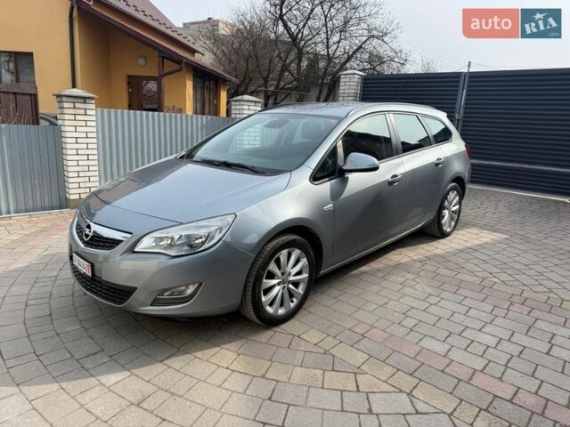 Серый Опель Астра, объемом двигателя 1.4 л и пробегом 153 тыс. км за 7499 $, фото 8 на Automoto.ua