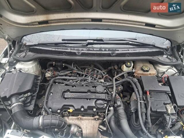 Серый Опель Астра, объемом двигателя 1.36 л и пробегом 234 тыс. км за 6300 $, фото 7 на Automoto.ua