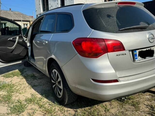 Серый Опель Астра, объемом двигателя 1.7 л и пробегом 220 тыс. км за 6500 $, фото 2 на Automoto.ua