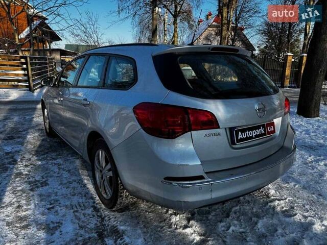 Серый Опель Астра, объемом двигателя 1.7 л и пробегом 332 тыс. км за 7290 $, фото 9 на Automoto.ua
