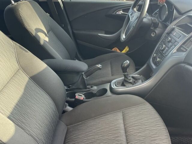 Серый Опель Астра, объемом двигателя 1.2 л и пробегом 230 тыс. км за 5600 $, фото 6 на Automoto.ua