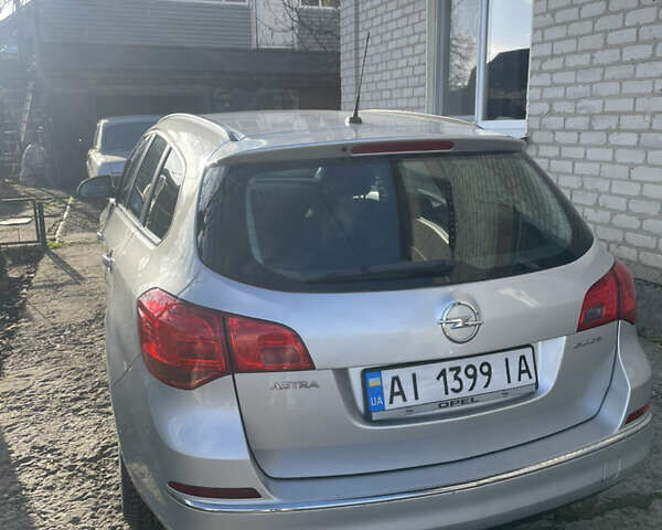 Сірий Опель Астра, об'ємом двигуна 1.3 л та пробігом 230 тис. км за 5600 $, фото 2 на Automoto.ua