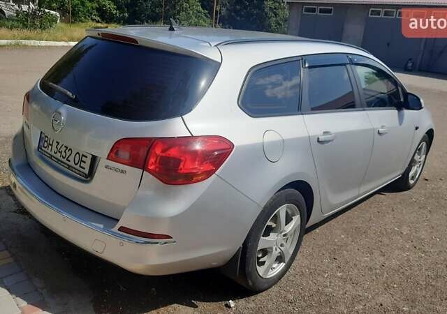 Серый Опель Астра, объемом двигателя 1.6 л и пробегом 260 тыс. км за 7500 $, фото 5 на Automoto.ua