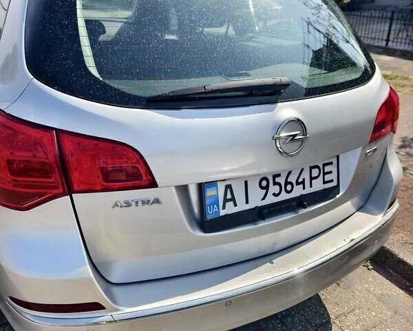 Серый Опель Астра, объемом двигателя 1.96 л и пробегом 307 тыс. км за 7300 $, фото 12 на Automoto.ua