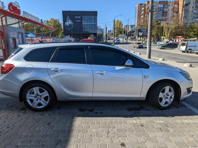 Серый Опель Астра, объемом двигателя 1.7 л и пробегом 170 тыс. км за 8900 $, фото 7 на Automoto.ua