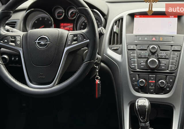 Опель Астра 2014 в Хмельницком на Automoto.ua Серый Опель Астра, объемом двигателя 1.6 л и пробегом 192 тыс. км за 7950 $, фото 18 на Automoto.ua