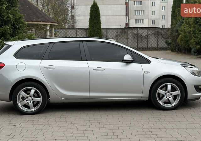 Опель Астра 2014 в Хмельницком на Automoto.ua Серый Опель Астра, объемом двигателя 1.6 л и пробегом 192 тыс. км за 7950 $, фото 5 на Automoto.ua
