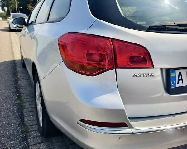 Серый Опель Астра, объемом двигателя 1.96 л и пробегом 307 тыс. км за 7300 $, фото 31 на Automoto.ua
