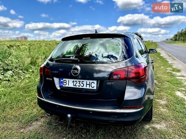 Серый Опель Астра, объемом двигателя 2 л и пробегом 246 тыс. км за 8500 $, фото 6 на Automoto.ua