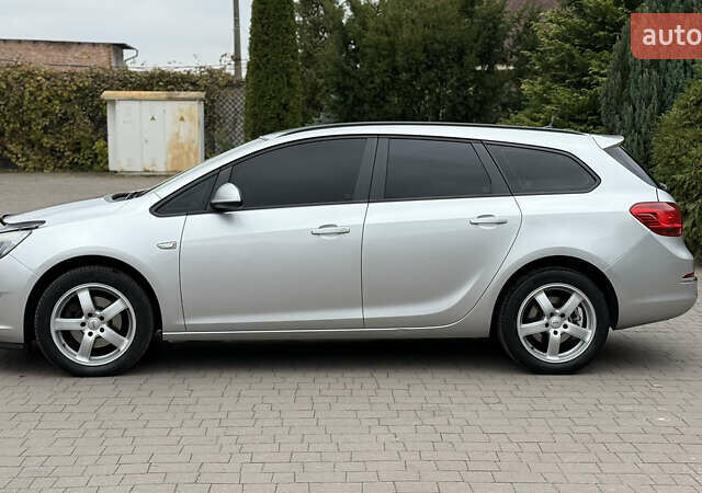 Опель Астра 2014 в Хмельницком на Automoto.ua Серый Опель Астра, объемом двигателя 1.6 л и пробегом 192 тыс. км за 7950 $, фото 4 на Automoto.ua