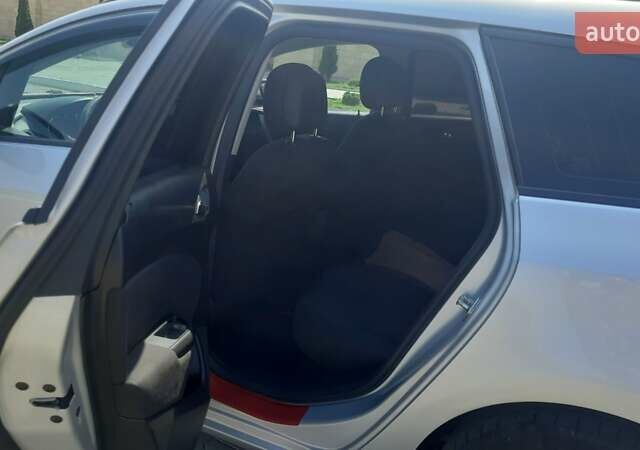 Серый Опель Астра, объемом двигателя 1.6 л и пробегом 260 тыс. км за 7500 $, фото 8 на Automoto.ua