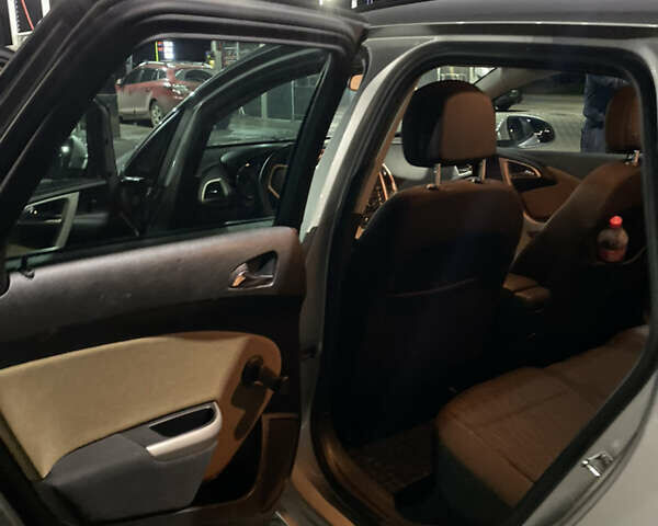 Серый Опель Астра, объемом двигателя 1.69 л и пробегом 213 тыс. км за 9400 $, фото 4 на Automoto.ua