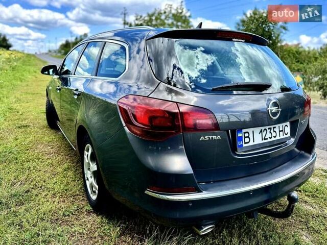 Серый Опель Астра, объемом двигателя 2 л и пробегом 246 тыс. км за 8500 $, фото 5 на Automoto.ua