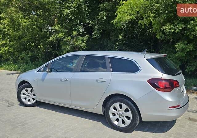 Серый Опель Астра, объемом двигателя 1.6 л и пробегом 280 тыс. км за 8699 $, фото 23 на Automoto.ua