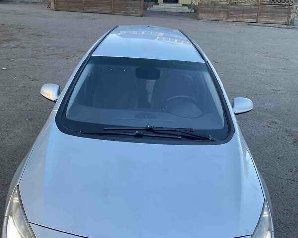 Серый Опель Астра, объемом двигателя 1.6 л и пробегом 300 тыс. км за 7700 $, фото 5 на Automoto.ua