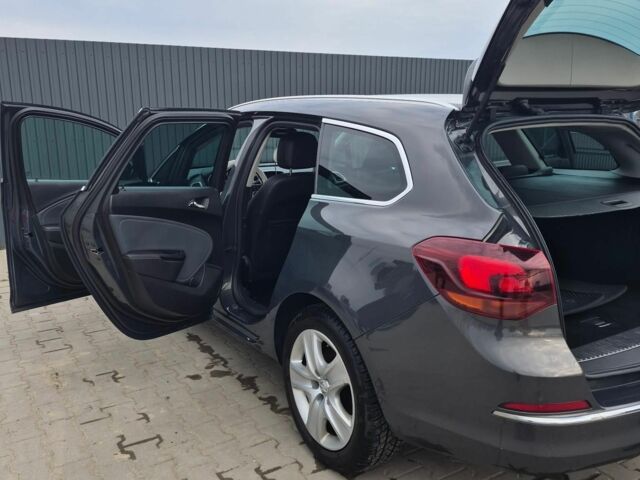 Серый Опель Астра, объемом двигателя 1.6 л и пробегом 247 тыс. км за 7300 $, фото 5 на Automoto.ua