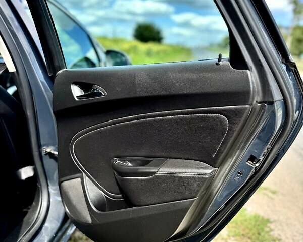 Серый Опель Астра, объемом двигателя 2 л и пробегом 246 тыс. км за 8500 $, фото 10 на Automoto.ua